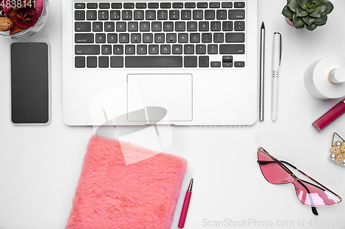 Image of Flat lay, mock-up. Feminine home office workspace, copyspace