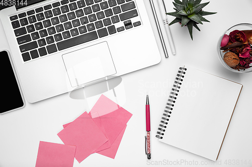 Image of Flat lay, mock-up. Feminine home office workspace, copyspace