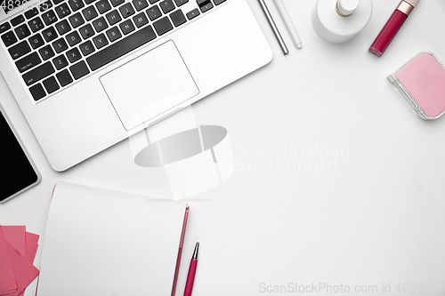 Image of Flat lay, mock-up. Feminine home office workspace, copyspace