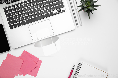 Image of Flat lay, mock-up. Feminine home office workspace, copyspace