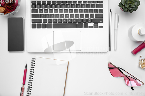 Image of Flat lay, mock-up. Feminine home office workspace, copyspace