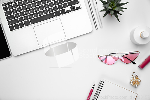 Image of Flat lay, mock-up. Feminine home office workspace, copyspace