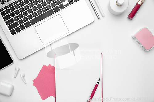 Image of Flat lay, mock-up. Feminine home office workspace, copyspace