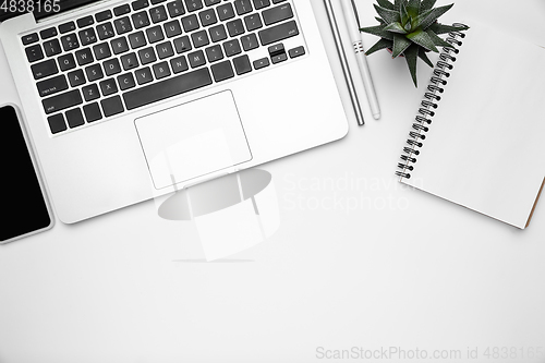 Image of Flat lay, mock-up. Feminine home office workspace, copyspace