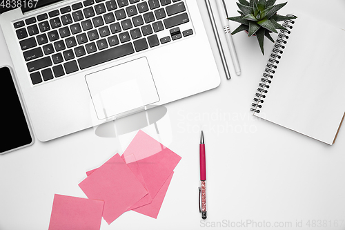 Image of Flat lay, mock-up. Feminine home office workspace, copyspace