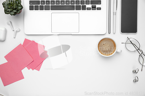 Image of Flat lay, mock-up. Feminine home office workspace, copyspace