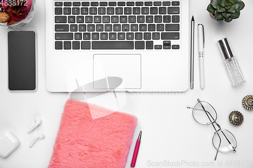 Image of Flat lay, mock-up. Feminine home office workspace, copyspace