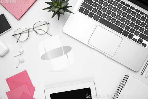 Image of Flat lay, mock-up. Feminine home office workspace, copyspace