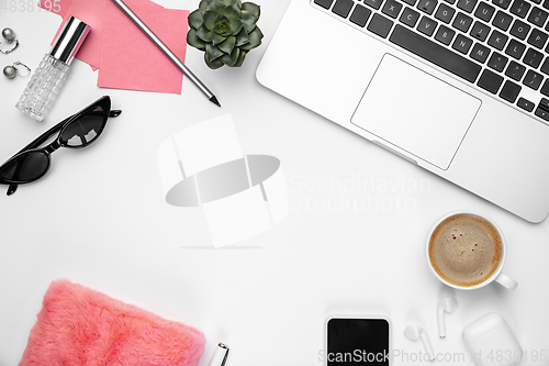 Image of Flat lay, mock-up. Feminine home office workspace, copyspace