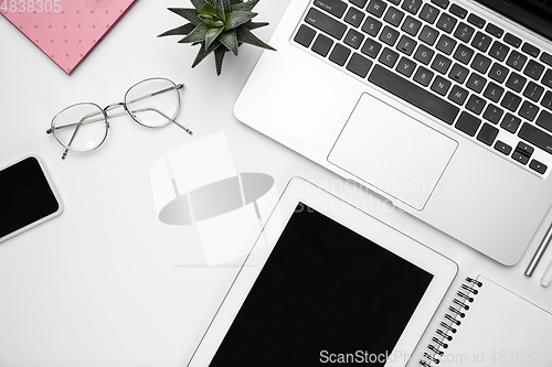 Image of Flat lay, mock-up. Feminine home office workspace, copyspace