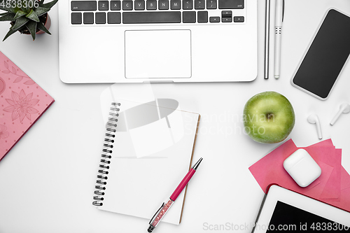 Image of Flat lay, mock-up. Feminine home office workspace, copyspace