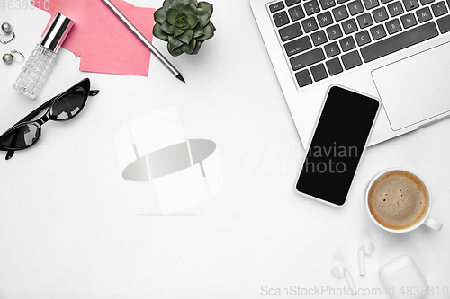 Image of Flat lay, mock-up. Feminine home office workspace, copyspace