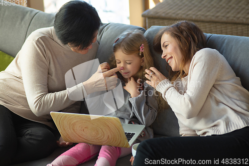 Image of Happy loving family. Grandmother, mother and daughter spending time together