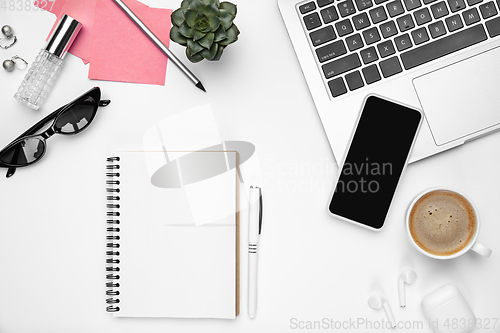 Image of Flat lay, mock-up. Feminine home office workspace, copyspace