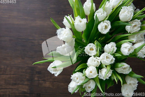 Image of Close up of fashion modern bouquet of different flowers on wooden background