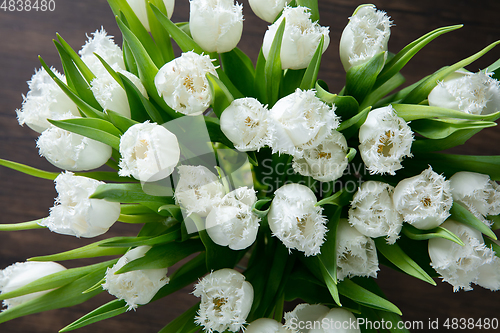 Image of Close up of fashion modern bouquet of different flowers on wooden background