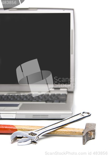 Image of laptop and tools