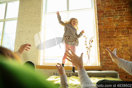 Image of Happy loving family. Grandmother, mother and daughter spending time together