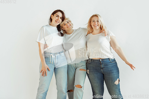 Image of Young women in casual clothes having fun together. Bodypositive concept.