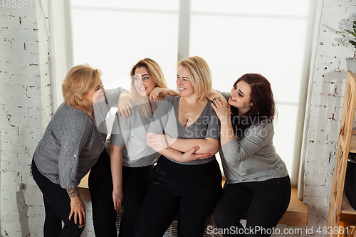 Image of Young women in casual clothes having fun together. Bodypositive concept.