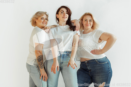 Image of Young women in casual clothes having fun together. Bodypositive concept.