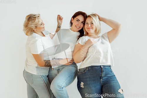 Image of Young women in casual clothes having fun together. Bodypositive concept.