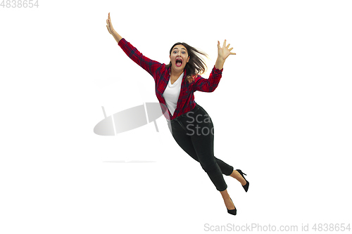 Image of A second before falling - young girl falling down with bright emotions and expression