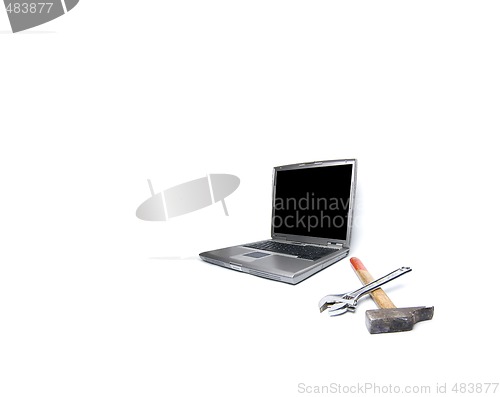 Image of laptop and tools