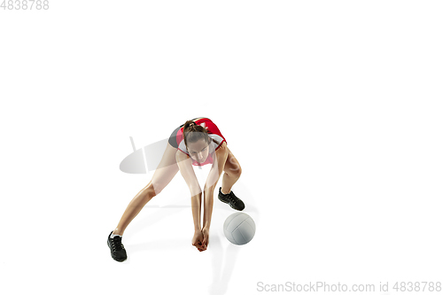 Image of Young female volleyball player isolated on white studio background in flight and motion