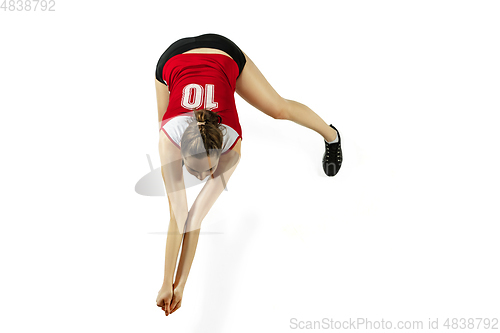 Image of Young female volleyball player isolated on white studio background in flight and motion