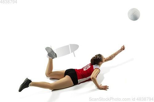 Image of Young female volleyball player isolated on white studio background in flight and motion