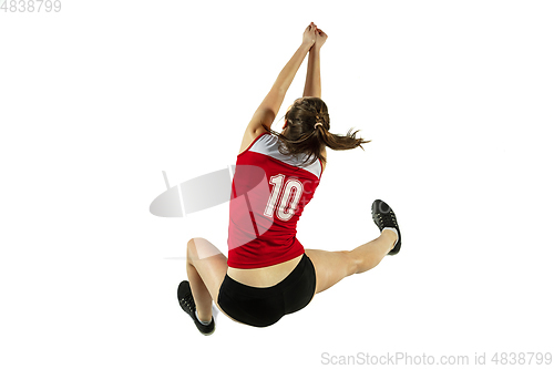 Image of Young female volleyball player isolated on white studio background in flight and motion
