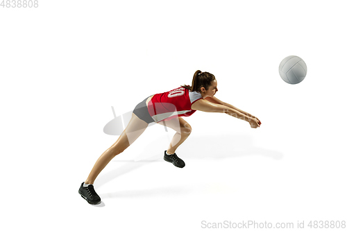 Image of Young female volleyball player isolated on white studio background in flight and motion