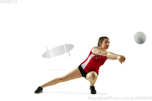 Image of Young female volleyball player isolated on white studio background in flight and motion