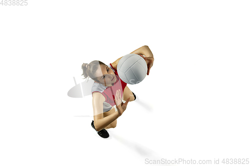 Image of Young female volleyball player isolated on white studio background in flight and motion