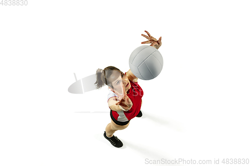 Image of Young female volleyball player isolated on white studio background in flight and motion