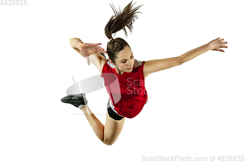 Image of Young female volleyball player isolated on white studio background in flight and motion