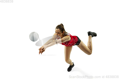 Image of Young female volleyball player isolated on white studio background in flight and motion