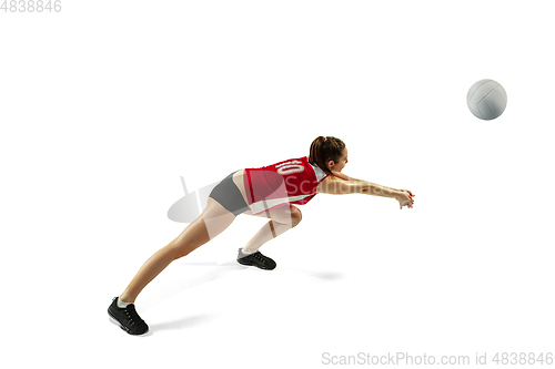 Image of Young female volleyball player isolated on white studio background in flight and motion