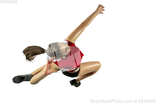 Image of Young female volleyball player isolated on white studio background in flight and motion