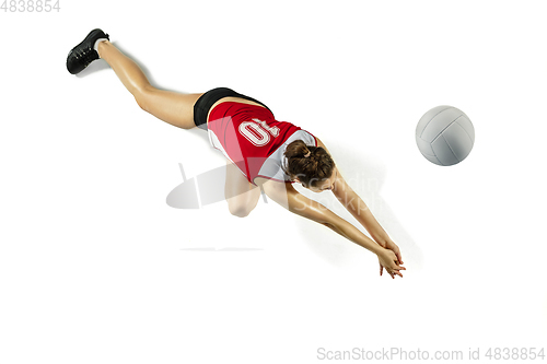Image of Young female volleyball player isolated on white studio background in flight and motion