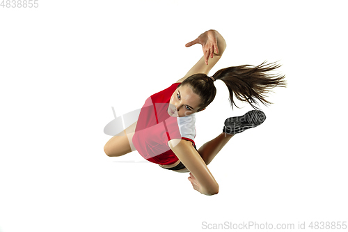 Image of Young female volleyball player isolated on white studio background in flight and motion