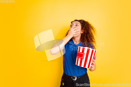 Image of Caucasian teen\'s girl portrait on yellow background