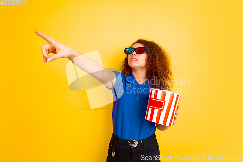 Image of Caucasian teen\'s girl portrait on yellow background