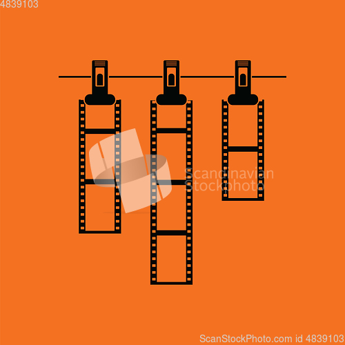 Image of Icon of photo film drying on rope with clothespin