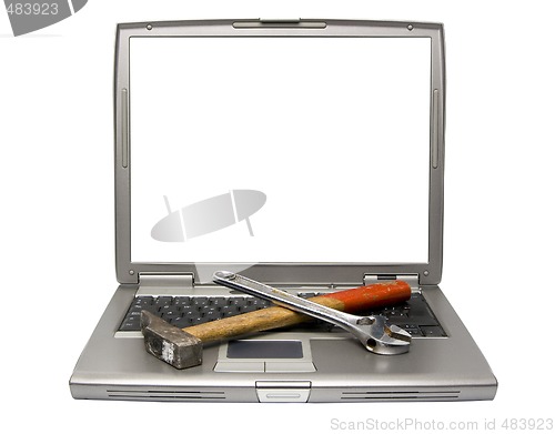 Image of laptop and tools