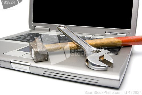 Image of laptop and tools