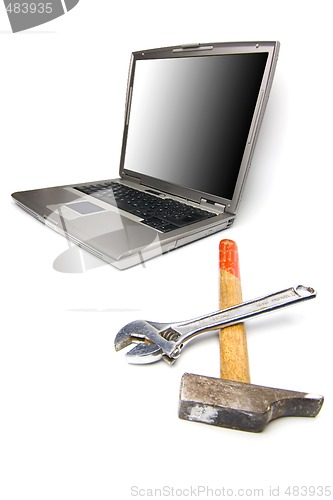 Image of laptop and tools