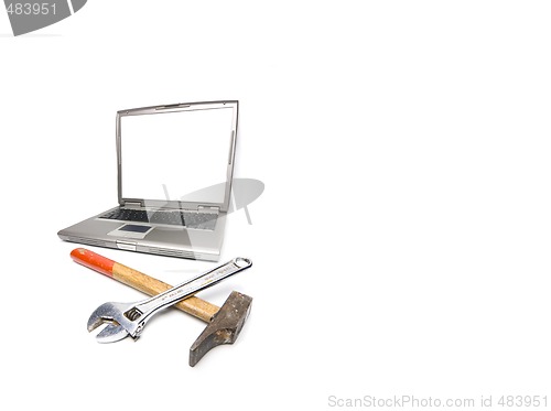 Image of laptop and tools