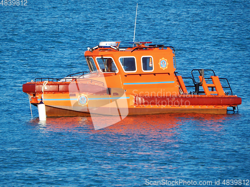 Image of Orange boat rescue.